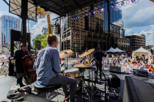 A photo of a band performing outdoors at Tri-C JazzFest